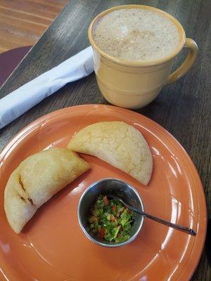 Chicken empanadas and vanilla latte