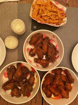 Donnys Spicy Fries. 30 Piece Party Pack. garlic parmesan wings, hot wings, and lemon pepper wings. Very tasty.