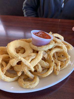 Side of onion rings with Sriracha ketchup