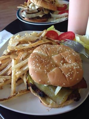 Everything burger...bacon, onions, mushrooms, green chiles, jalapeños, cheese, tomatoes, and lettuce ! A feast!