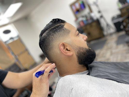 Drop skin fade W/ beard line up