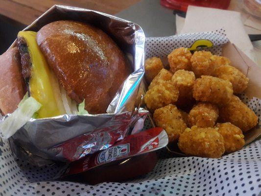 Burger with tots.