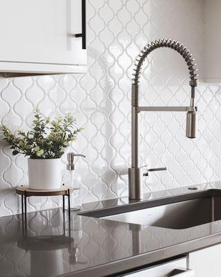 Beautiful backsplash and kitchen faucet