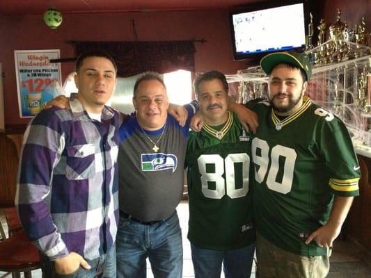 Father and sons enjoying the games on football Sunday !!