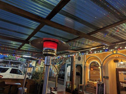 Outdoor patio with heat lamps - there were several tables. Heat lamp kept us very warm on an otherwise chilly night!