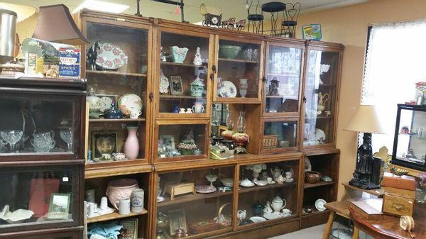 Old general store cabinet full of awesome pottery and porcelain