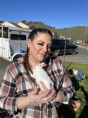 My mama snuggled up with one of the bunnies from the petting zoo. She states "Softest bunny I have ever touched!'.