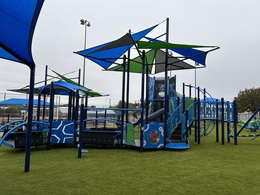 All new playground! With lots of accessible features. Not much for toddlers, if you have younger kids.