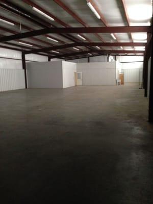 1209 Champion Way 6,000' building with 1,000' offices enclosed with overhead storage. Large outside concrete parking with 32' concrete drive