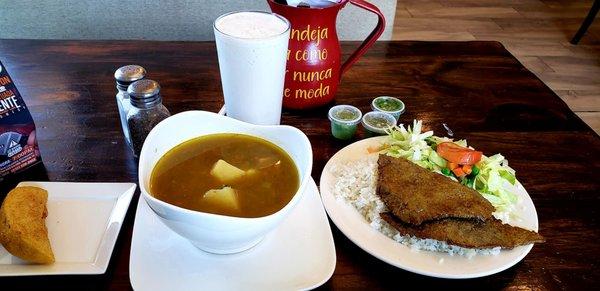 Lunch lentil soup special, chicken empanada with guanabana drink