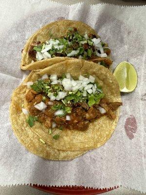 Al pastor and lengua tacos