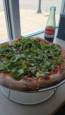 We got prosciutto,fig and arugula. It was fabulous with a crispy thin crust.