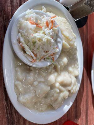 Chicken and noodles, mashed potatoes and coleslaw