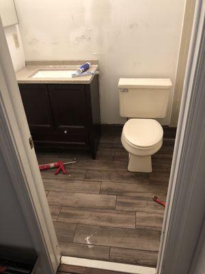 Tile floor and vanity install.