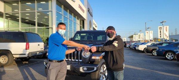 Manuel P. and Don T. Closing the deal on My New 2021 Jeep Sahara! "The Official Key Exchange" Thank You Manuel!