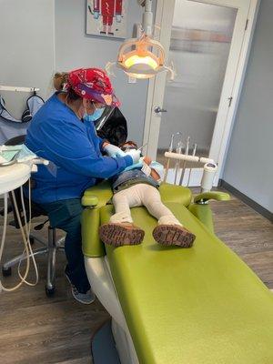 Sandra, with her wonderful kid explanations (" I'm looking for a chicken nugget, let's count your teeth,") kept my daughter in the chair.