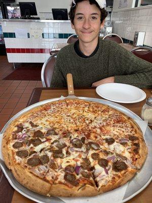 Delicious cheese and sausage pizza