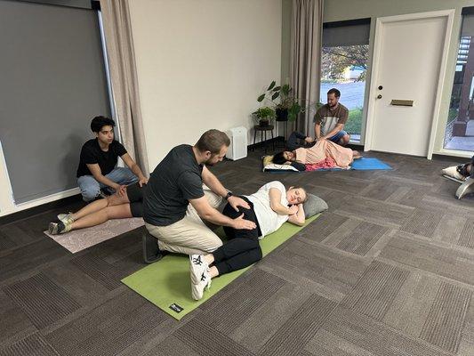 Partners learning more pregnancy comfort techniques to include them in the pregnancy journey.