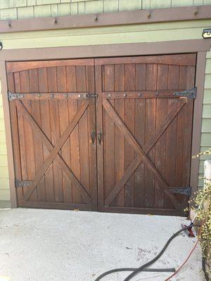 Before-sanding and staining the garage barn doors