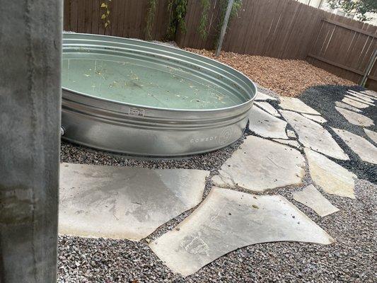 Flagstones & Xeriscape around stock tank pool