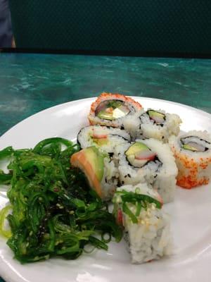 Seaweed salad and sushi.