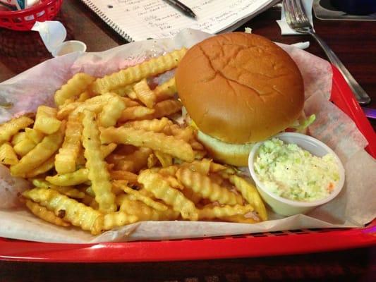 Burger, fries and side of coleslaw.