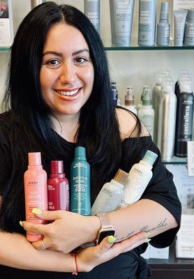 Meet Danelle. She loves her Aveda and knows it too.