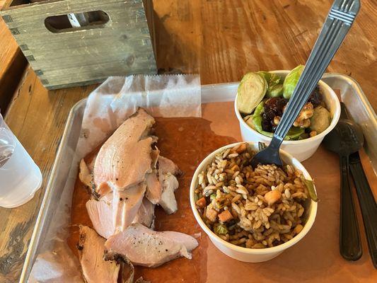 Turkey meat with rice and Brussels Sprouts.