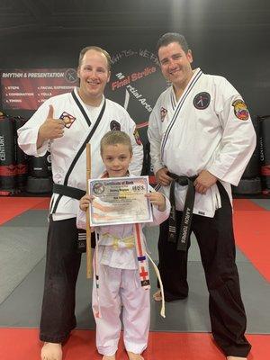 My grandson and his two instructors.