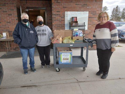 Donating to the Aurora Area Food Shelf!