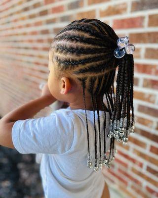 She did so good sitting for braids.