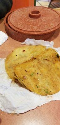 Corn tortillas from Carne asada tacos. Drenched in oil.