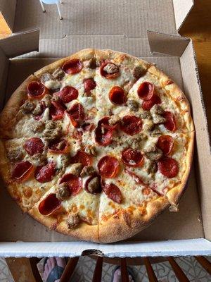 Pepperoni & sausage New York style pizza.