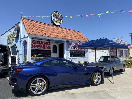 Grand Opening day with two of our loyal customers vehicles.