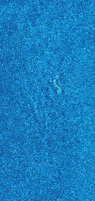 (2021) One white blotch on bottom of pool. 
 *Notice the vibrant blue in this picture.