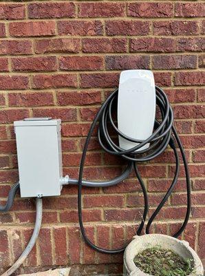 Disconnect and tesla charger installation