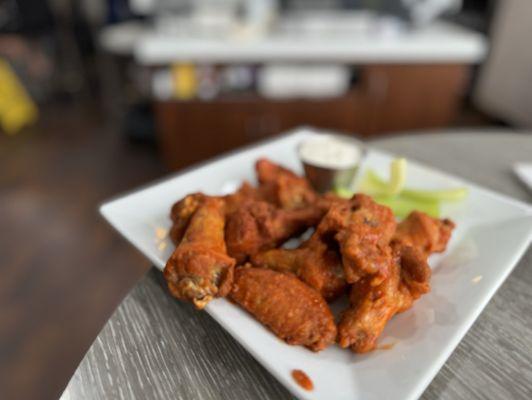 Let's try some airport buffalo wings