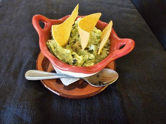 Guacamole made with fresh avocado, cilantro, Chile serrano, lemon