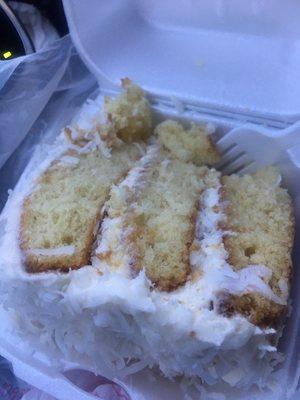 A very dense,dry and gummy slice of coconut cake