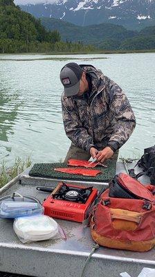 Drew filleting our salmon