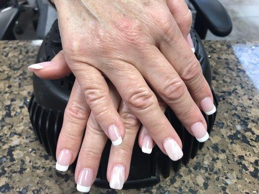 Nail dryer and granite countertop at salon