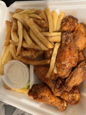 Hot garlic wings and fries (fried hard)