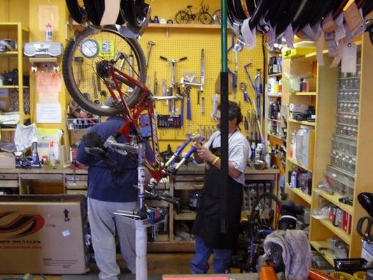 Tom and John working on a bike