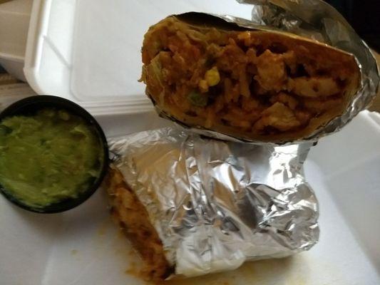 Hubby's chicken burrito with a side of guacamole.