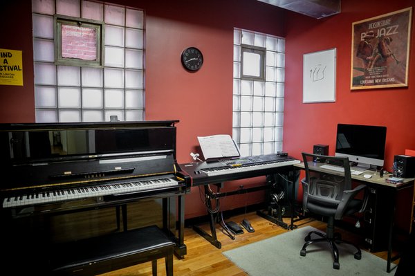 The Red Room at Union Lesson Studios is the perfect place to focus and learn the piano.