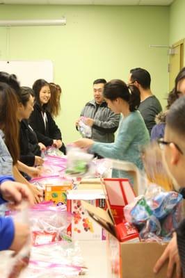 Packing care packages for the homeless in downtown San Jose.