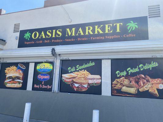 Oasis Market exterior signage.