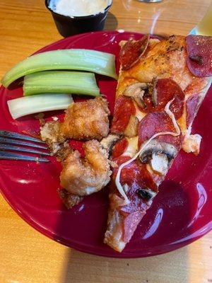 Slice of pizza, boneless wings & some celery.