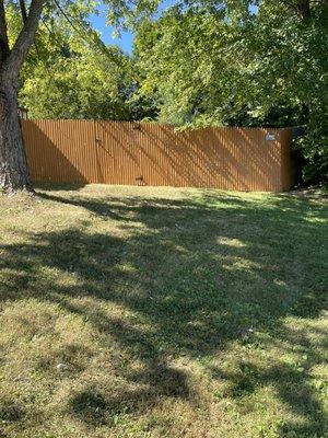 6' High Stained Stockade Fence.