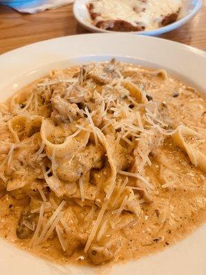 Really awesome blackened chicken and mushrooms with Alfredo sauce over fettuccine.